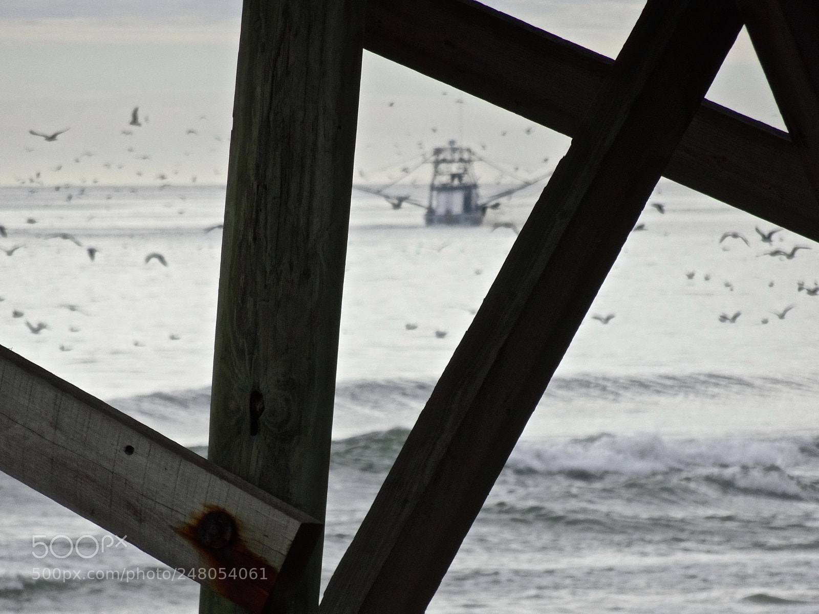 Sony Cyber-shot DSC-HX90V sample photo. Framing the shrimp trawler photography