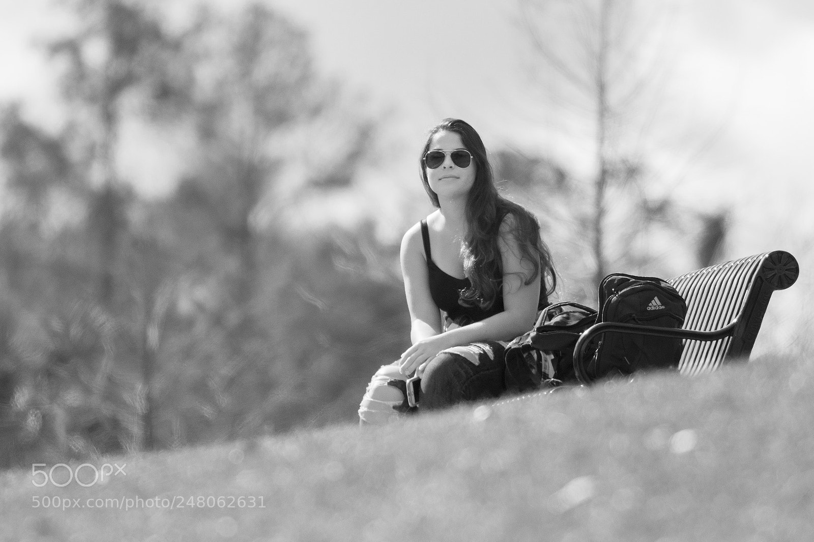 Canon EOS 7D Mark II sample photo. Raina on bench bw photography