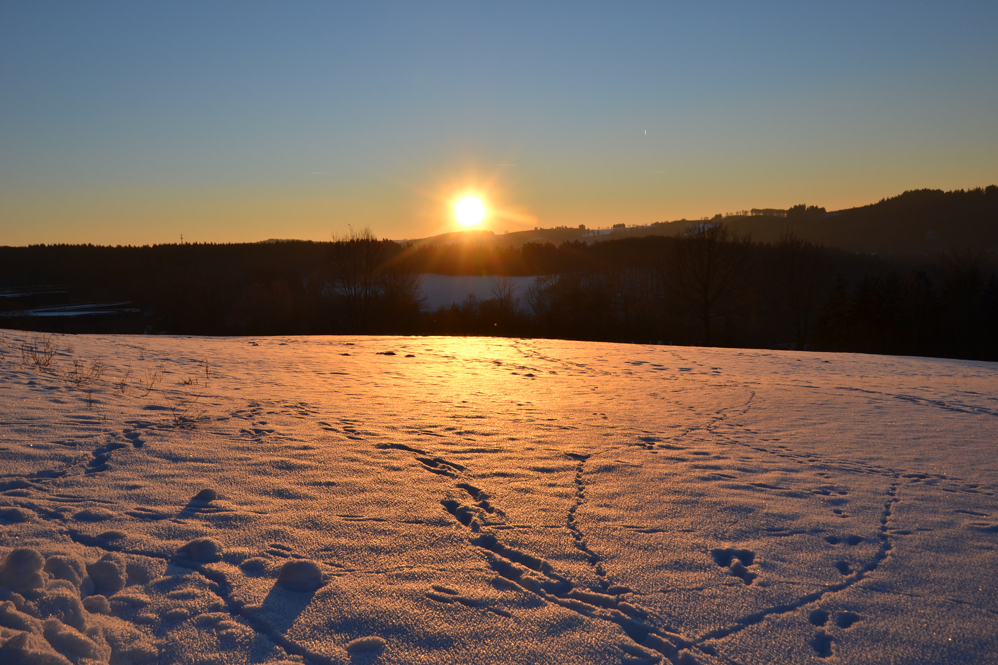 Nikon D3100 sample photo. Sonnenuntergang mit schnee photography