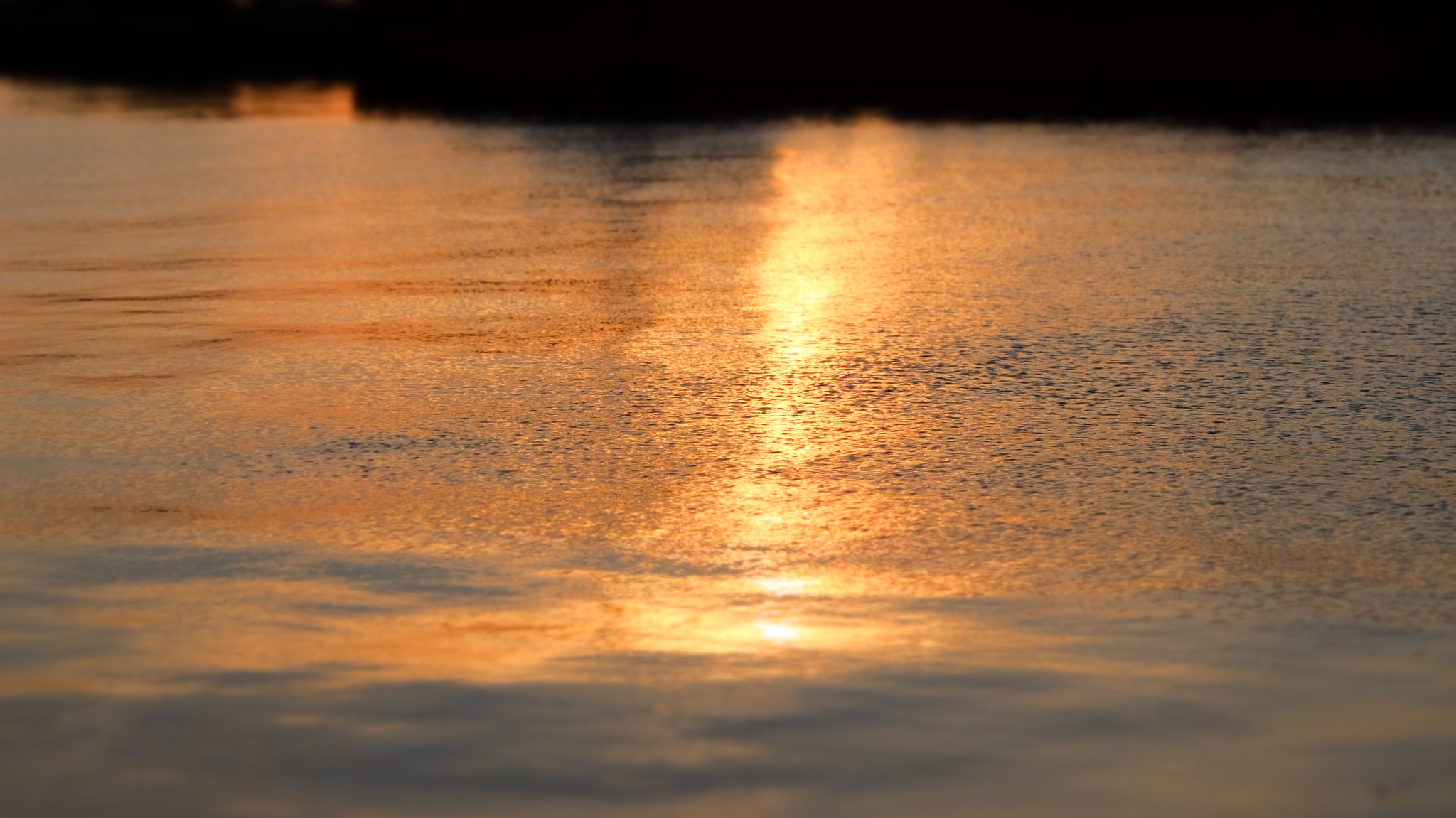 Fujifilm XQ1 sample photo. Sunset on water photography