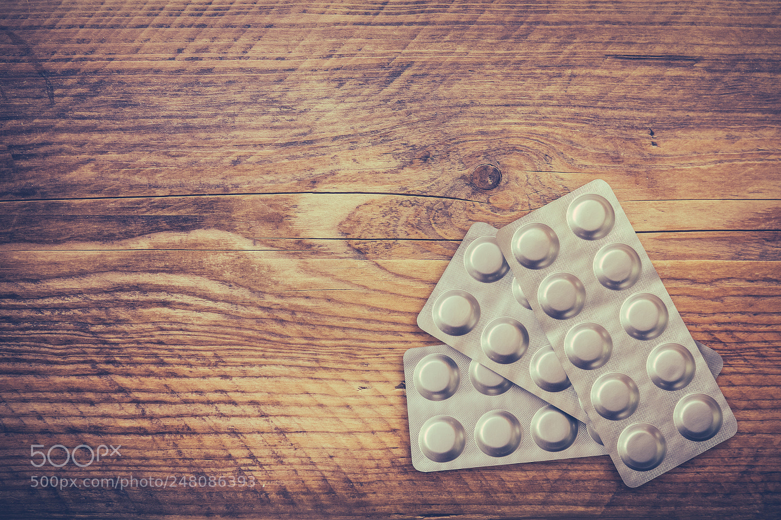 Sony Cyber-shot DSC-RX10 III sample photo. Medication on wooden table photography