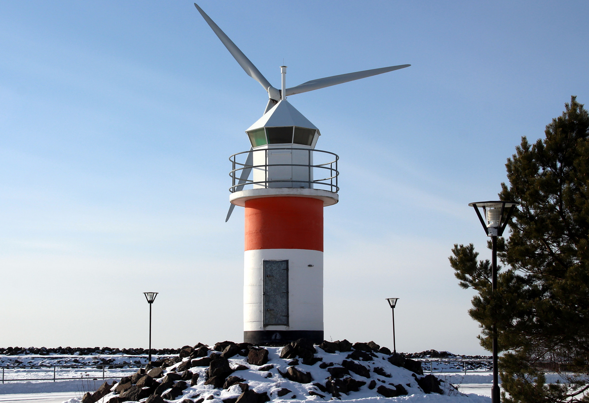 Sigma 18-200mm f/3.5-6.3 DC OS sample photo. The  small lighthouse and wings at the head. photography