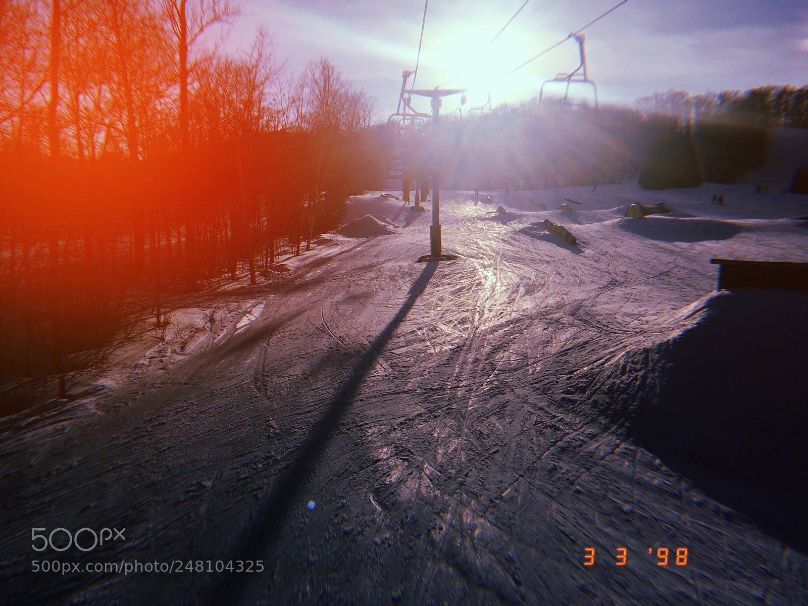Apple iPhone sample photo. Chairlift sun photography