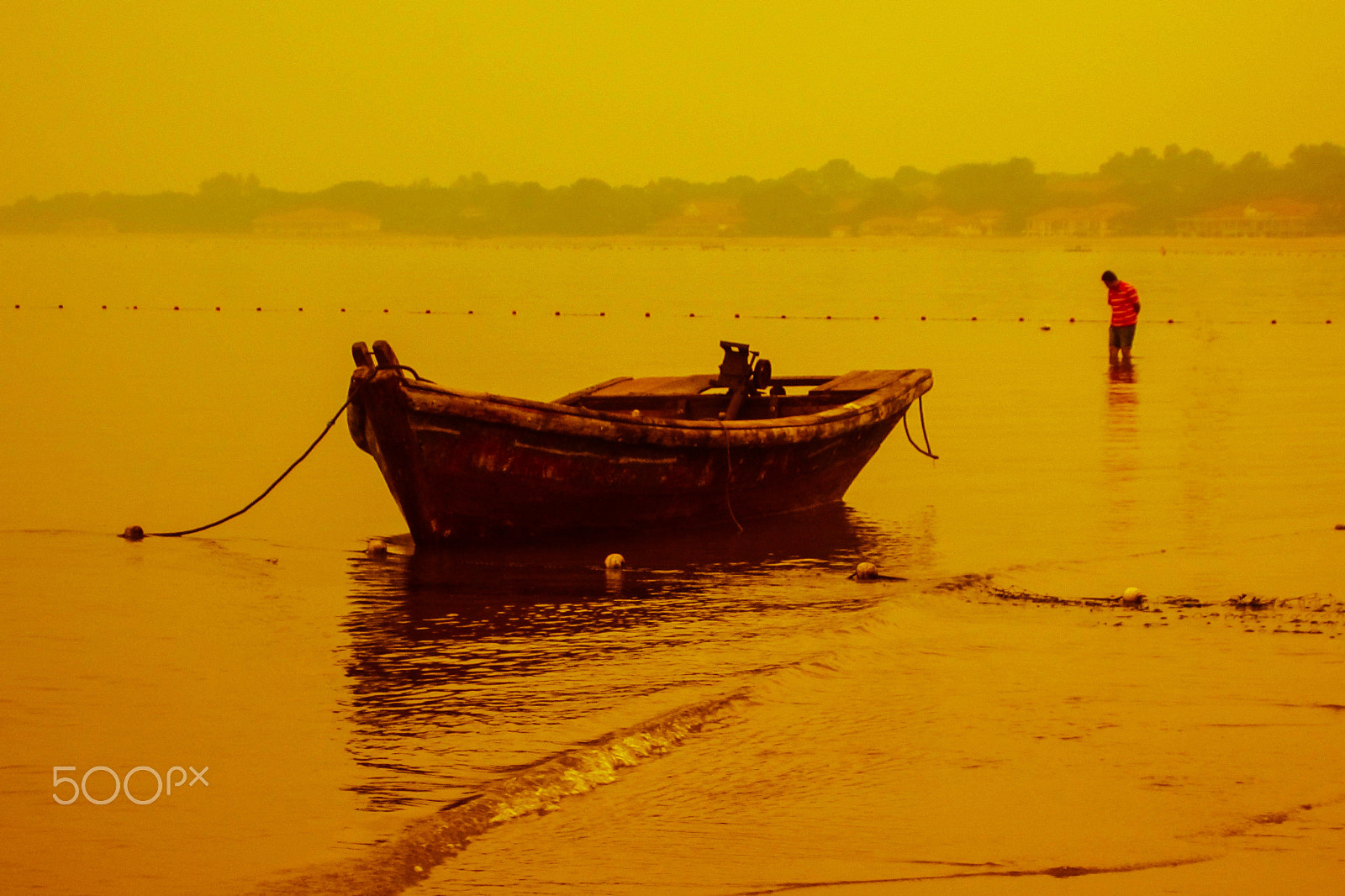 Canon PowerShot ELPH 300 HS (IXUS 220 HS / IXY 410F) sample photo. A tide - stranded boat photography