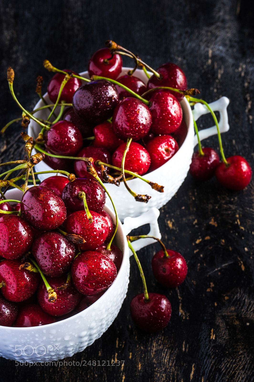 Sony a7 sample photo. Sweet cherries on dark photography