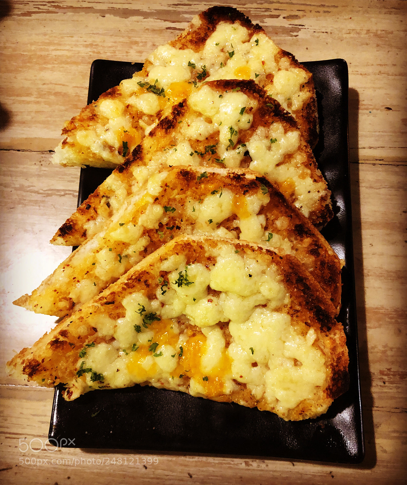 Apple iPhone X sample photo. Garlic bread photography