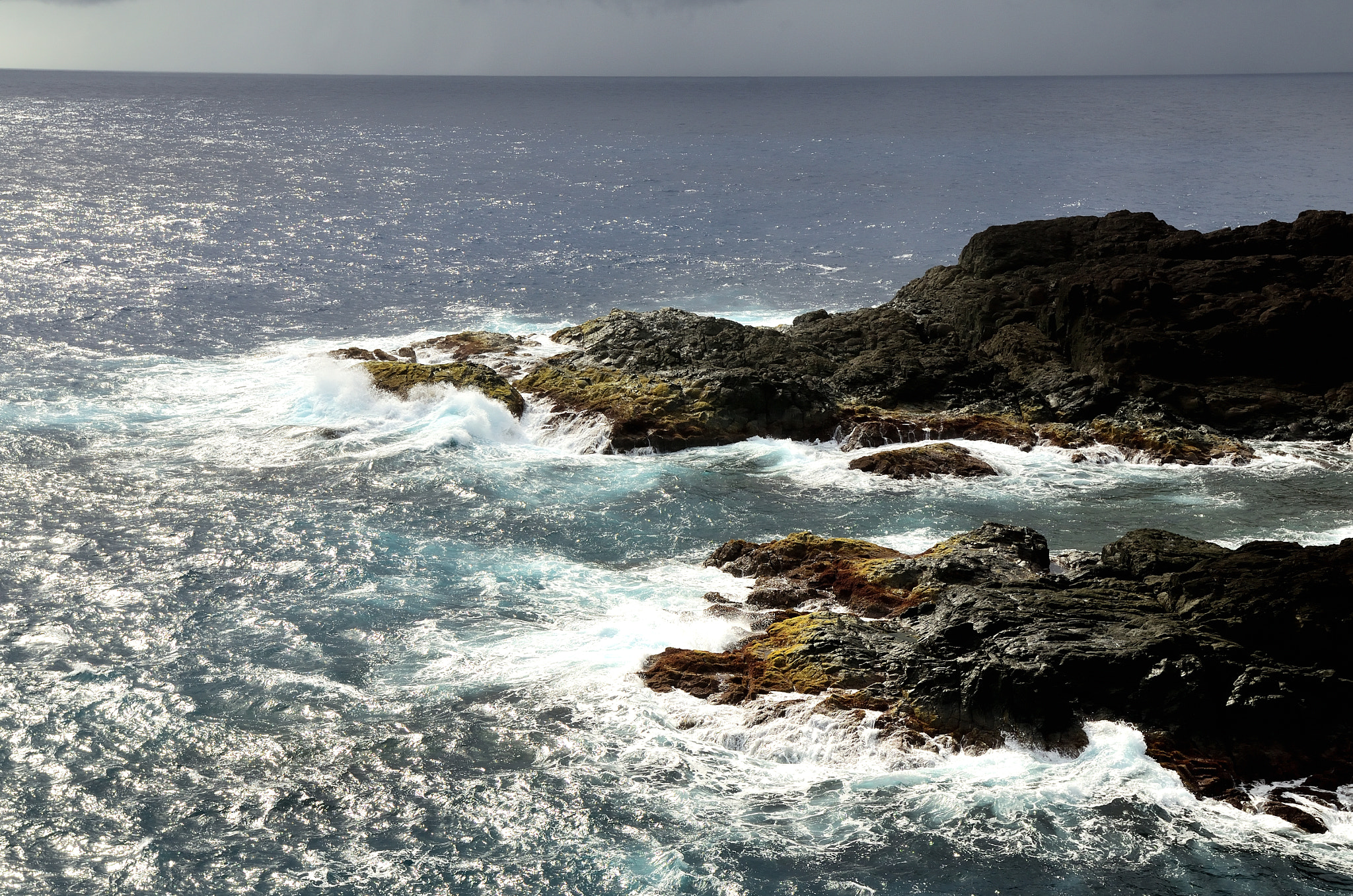 Nikon D5100 + Sigma 17-70mm F2.8-4 DC Macro OS HSM | C sample photo. Pacific versus rocks photography