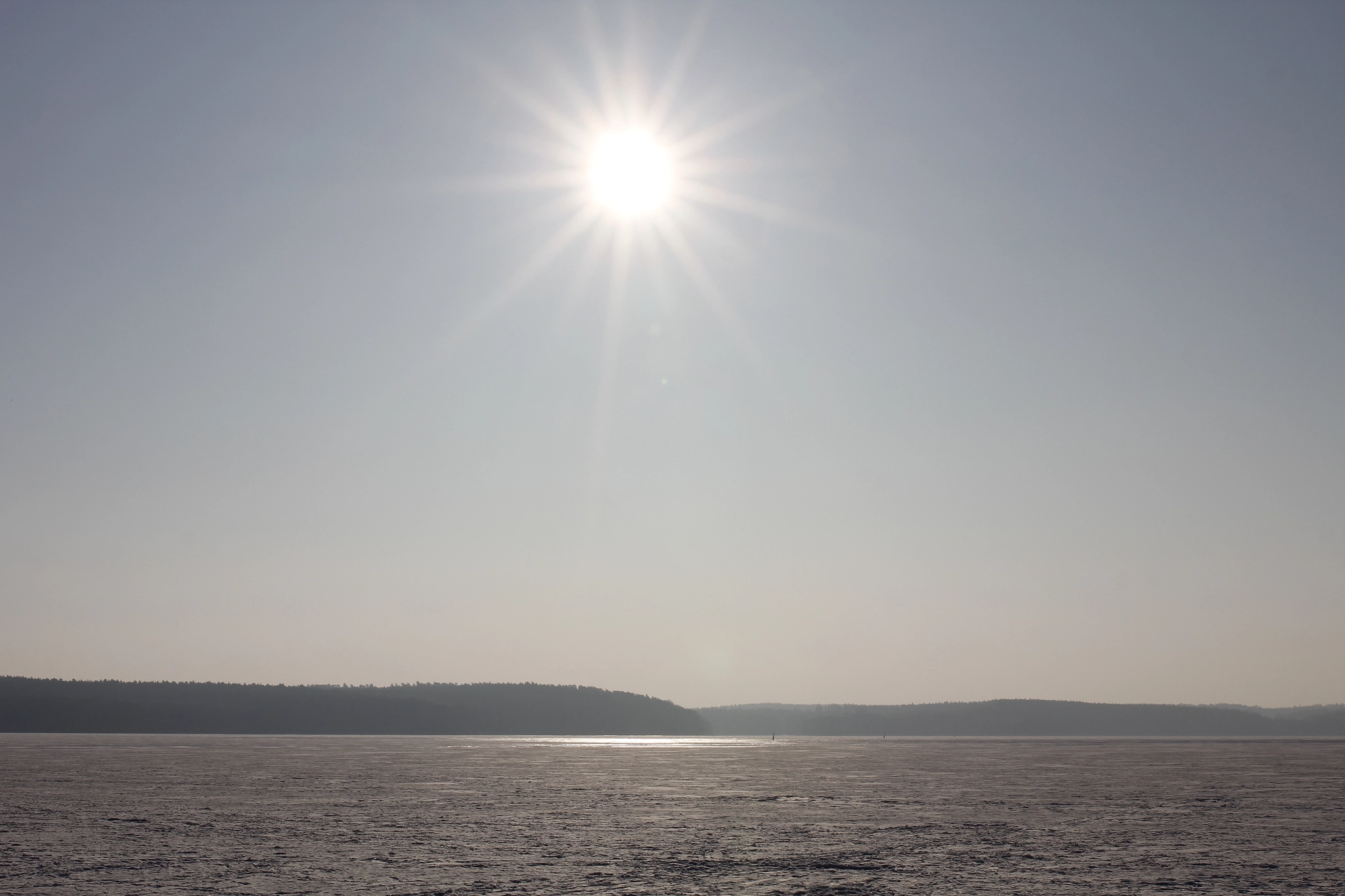 Canon EOS 60D + Sigma 35mm F1.4 DG HSM Art sample photo. Sun over frozen lake photography
