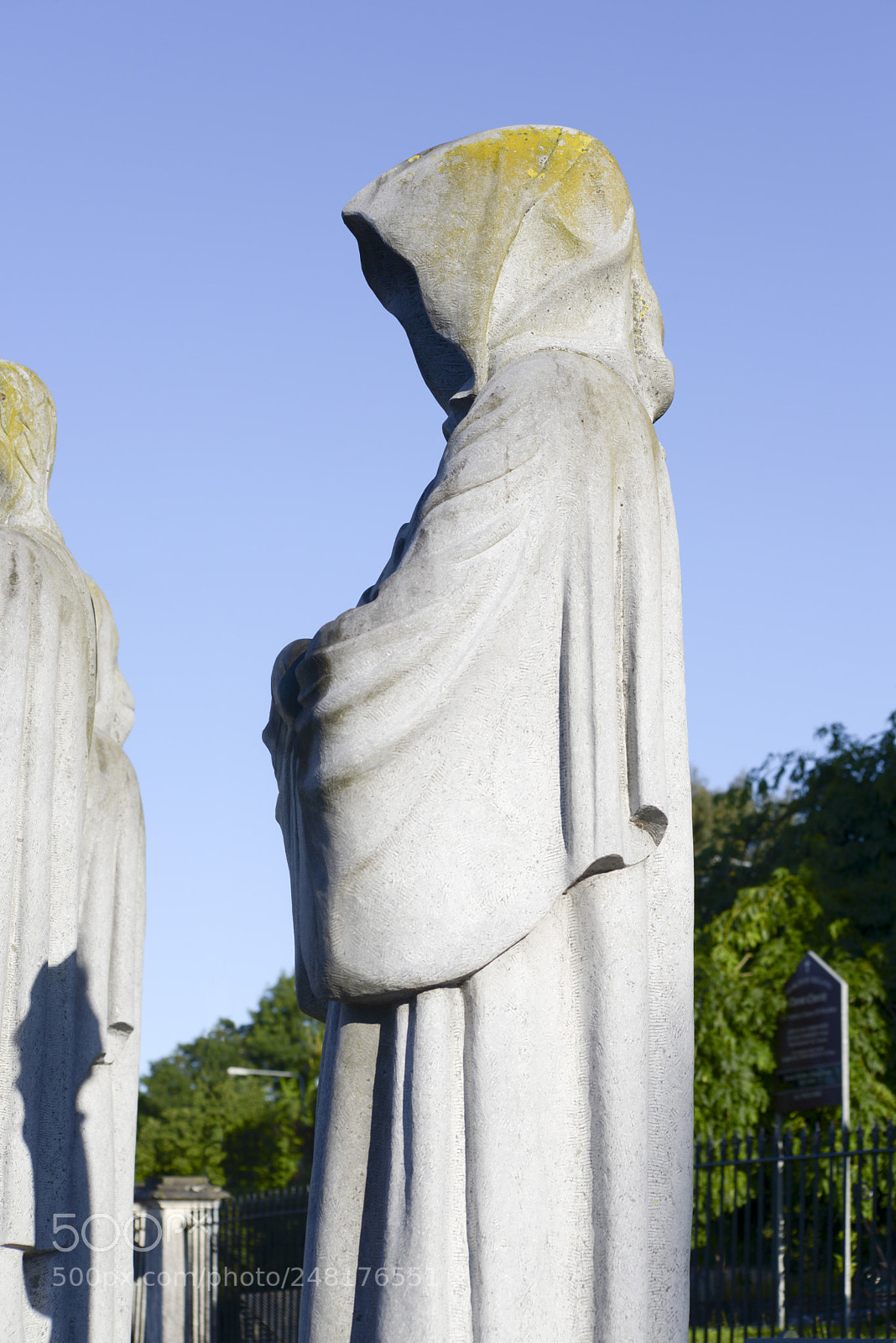Nikon D610 sample photo. Faceless monk statue outside photography