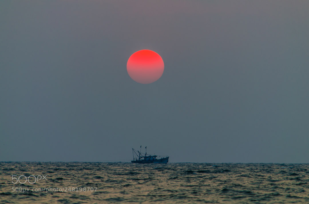 Nikon D5100 sample photo. Sunset and boat photography