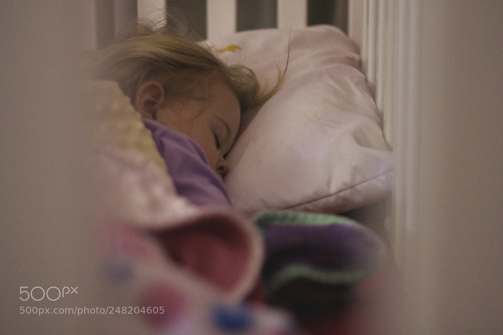Canon EOS 1100D (EOS Rebel T3 / EOS Kiss X50) sample photo. Toddler girl laying in photography