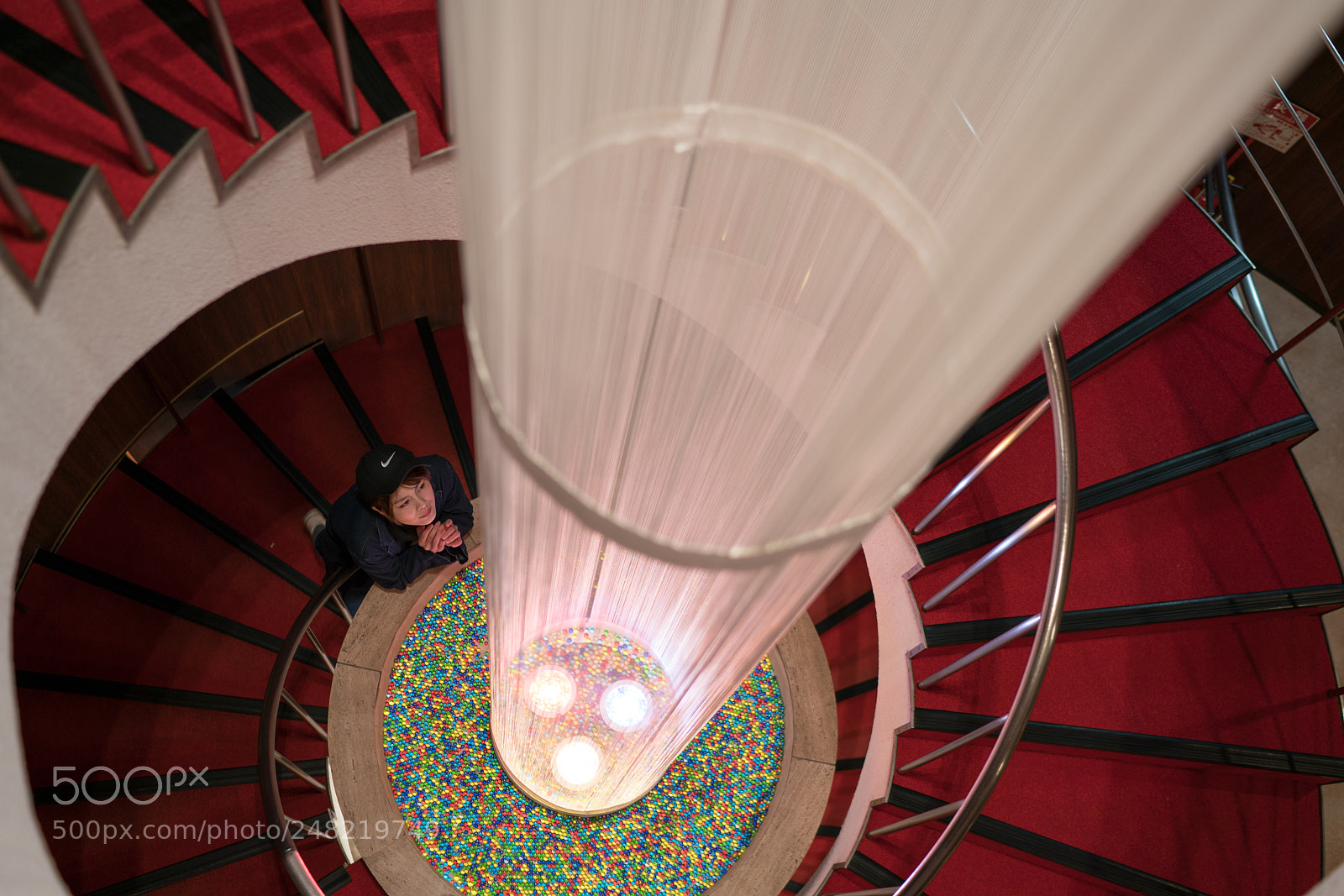 Sony a7R II sample photo. Spiral staircase,light,woman photography
