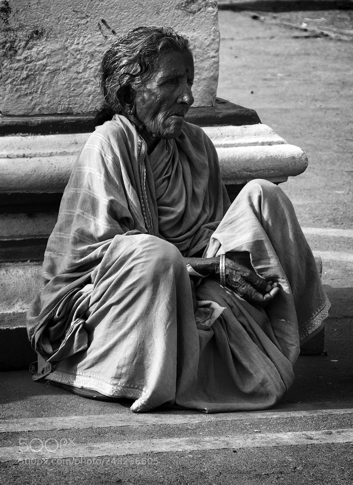 Canon EOS 50D sample photo. Older woman praying for photography