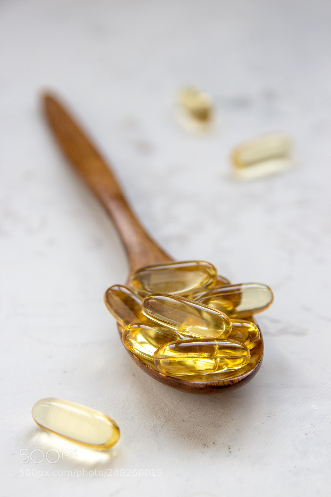 Canon EOS 600D (Rebel EOS T3i / EOS Kiss X5) sample photo. Yellow vitamin capsules, soft photography