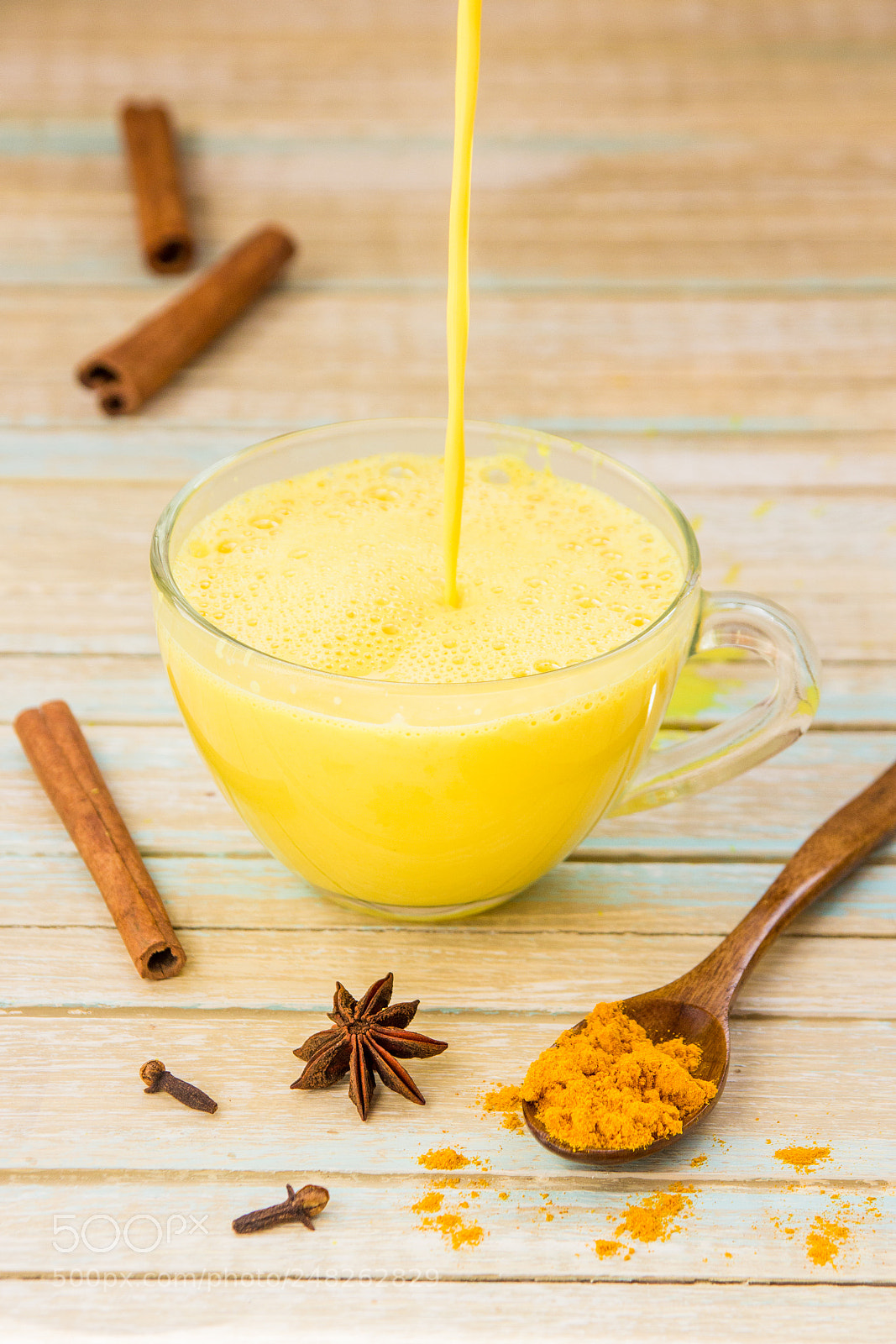 Canon EOS 600D (Rebel EOS T3i / EOS Kiss X5) sample photo. Golden turmeric milk pouring photography