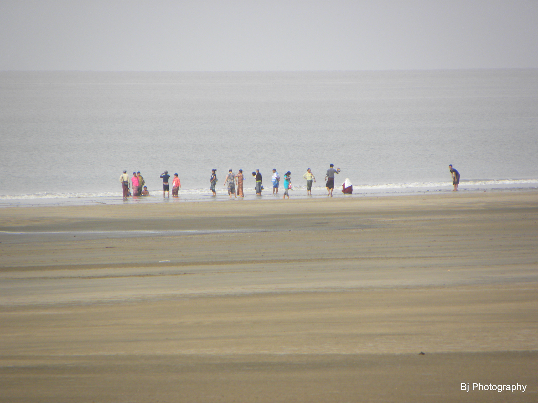 Nikon Coolpix P90 sample photo. People in the beach photography