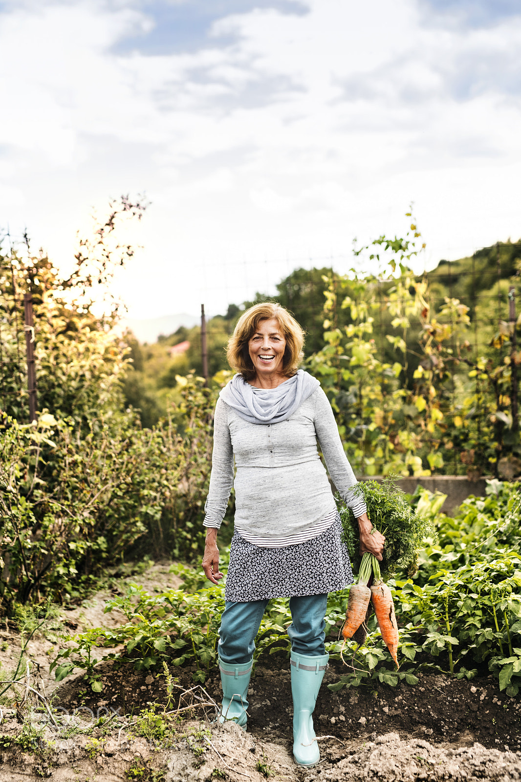 Nikon D5 sample photo. Senior woman gardening in photography