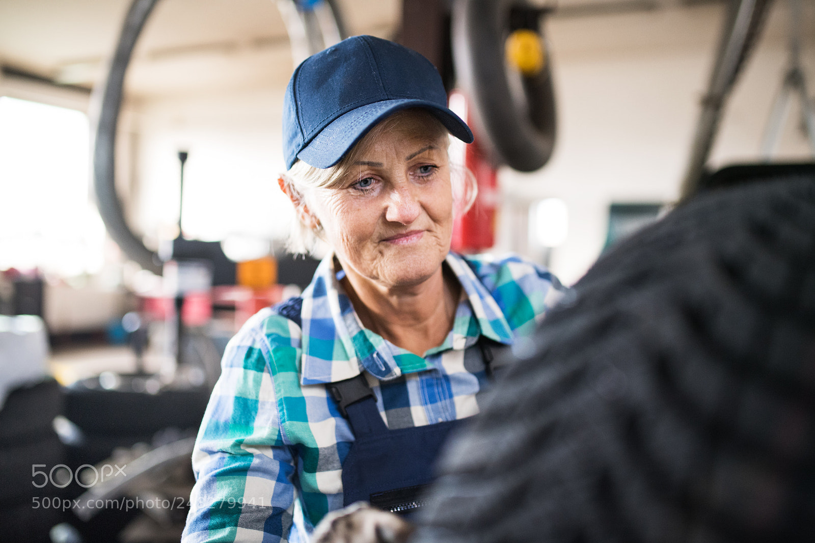 Nikon D5 sample photo. Senior female mechanic repairing photography