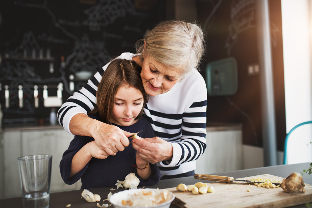 A small girl with grandmother cooking at home. by Jozef Polc on 500px.com