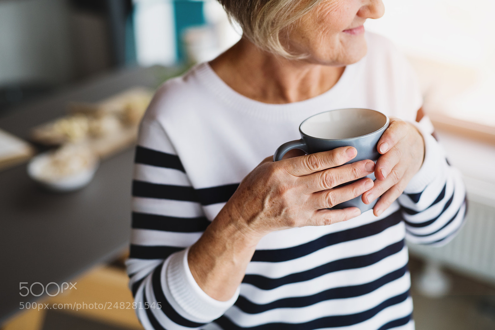 Nikon D5 sample photo. Senior woman holding a photography