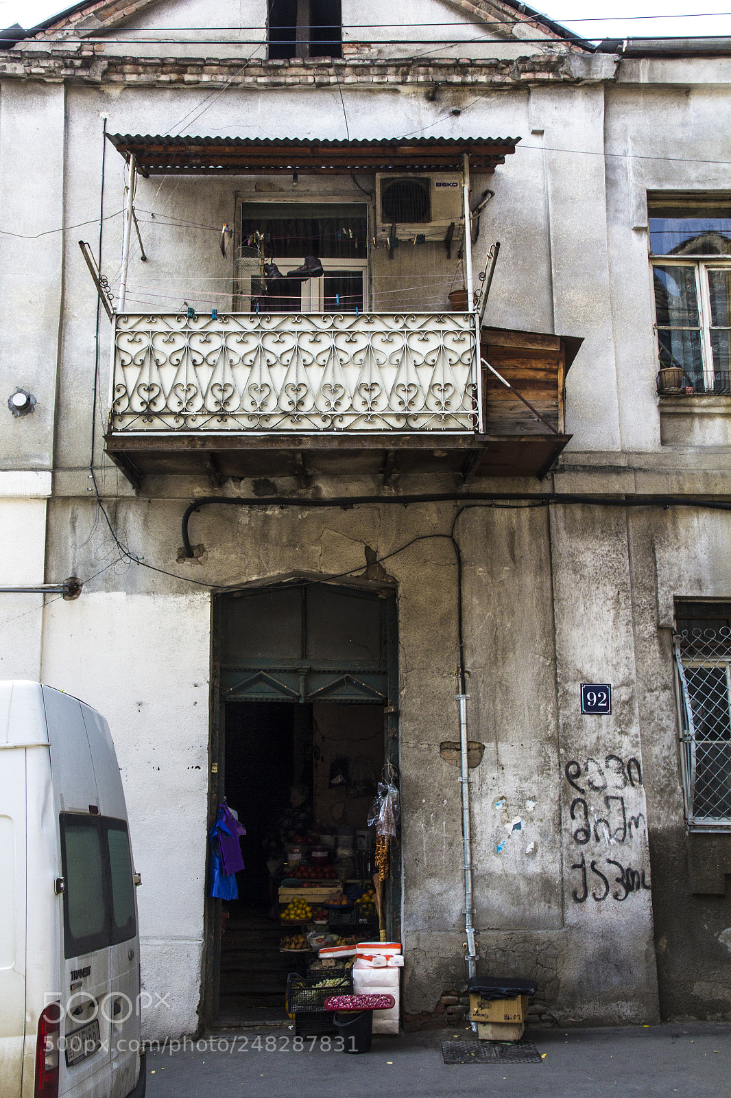 Canon EOS 60D sample photo. The door shop in photography