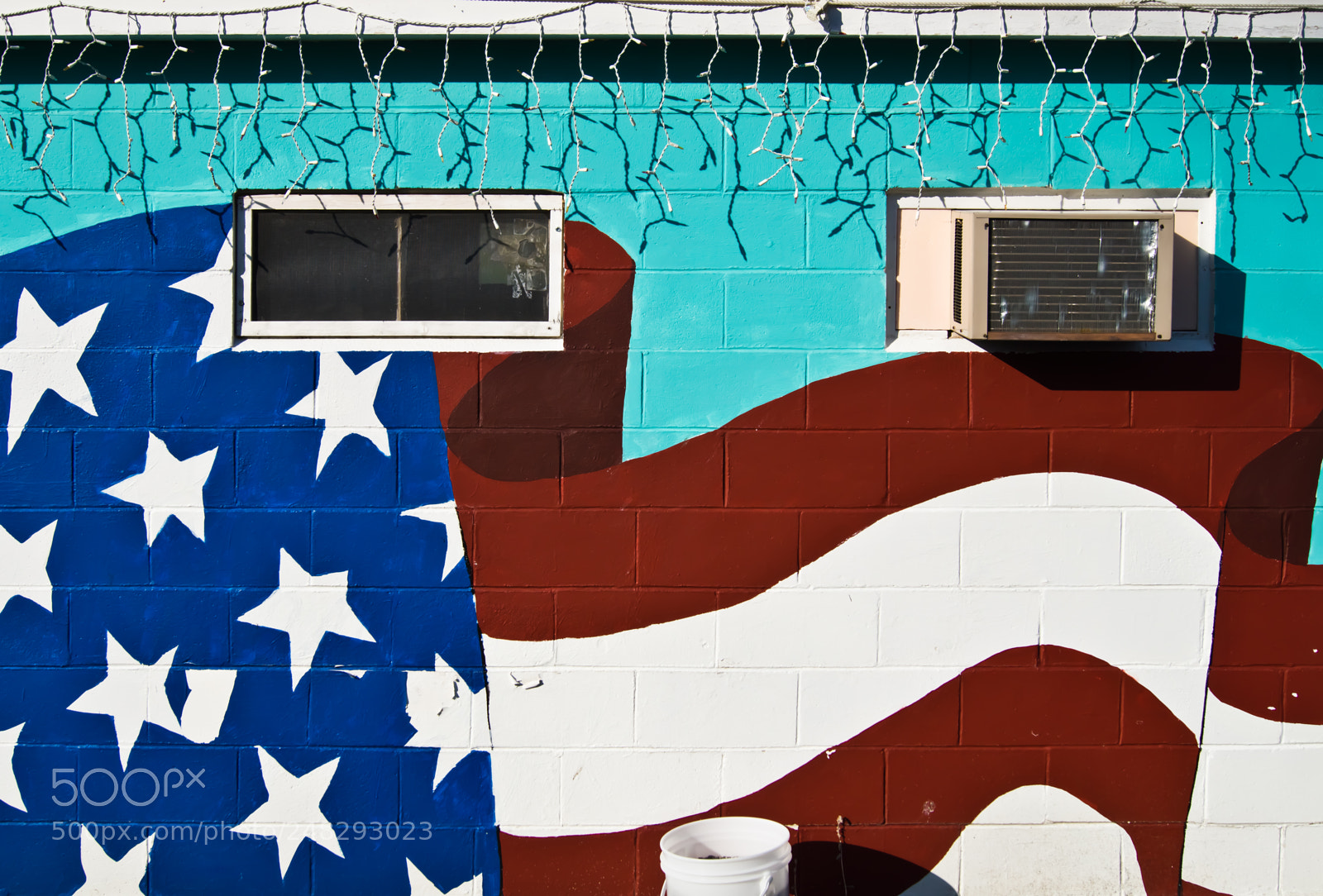 Sony SLT-A65 (SLT-A65V) sample photo. Building with american flag photography