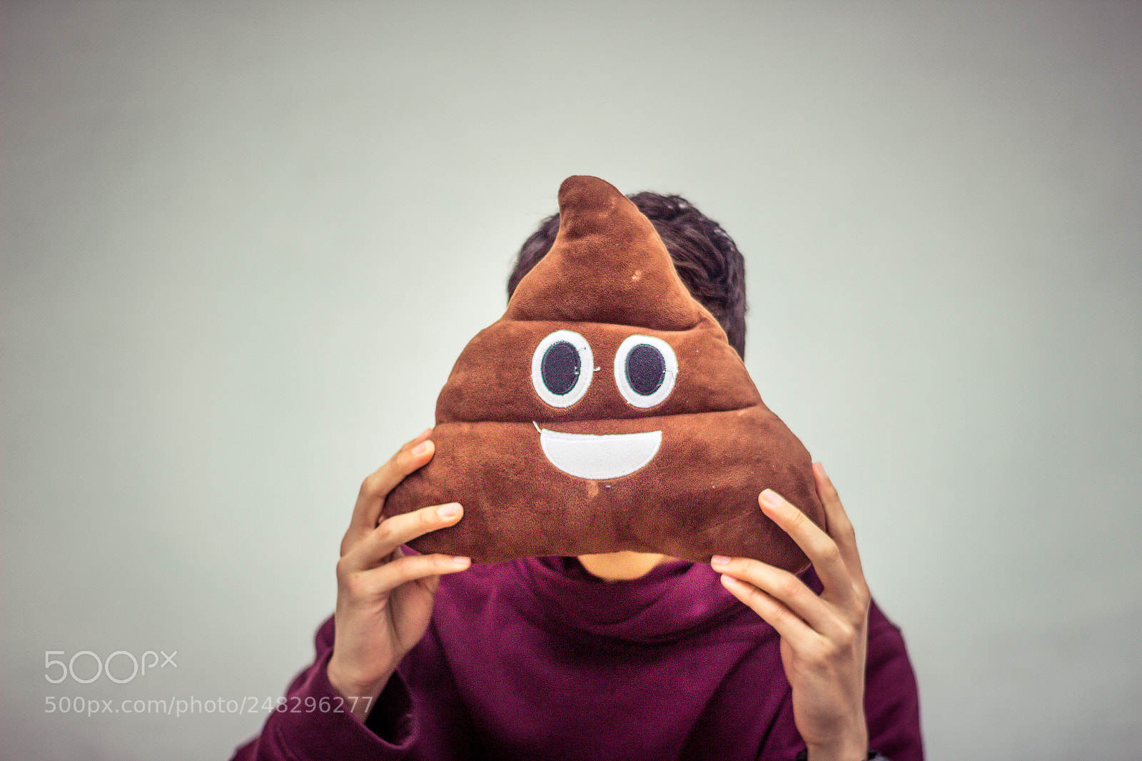 Canon EOS 1200D (EOS Rebel T5 / EOS Kiss X70 / EOS Hi) sample photo. Man with poop emoji photography
