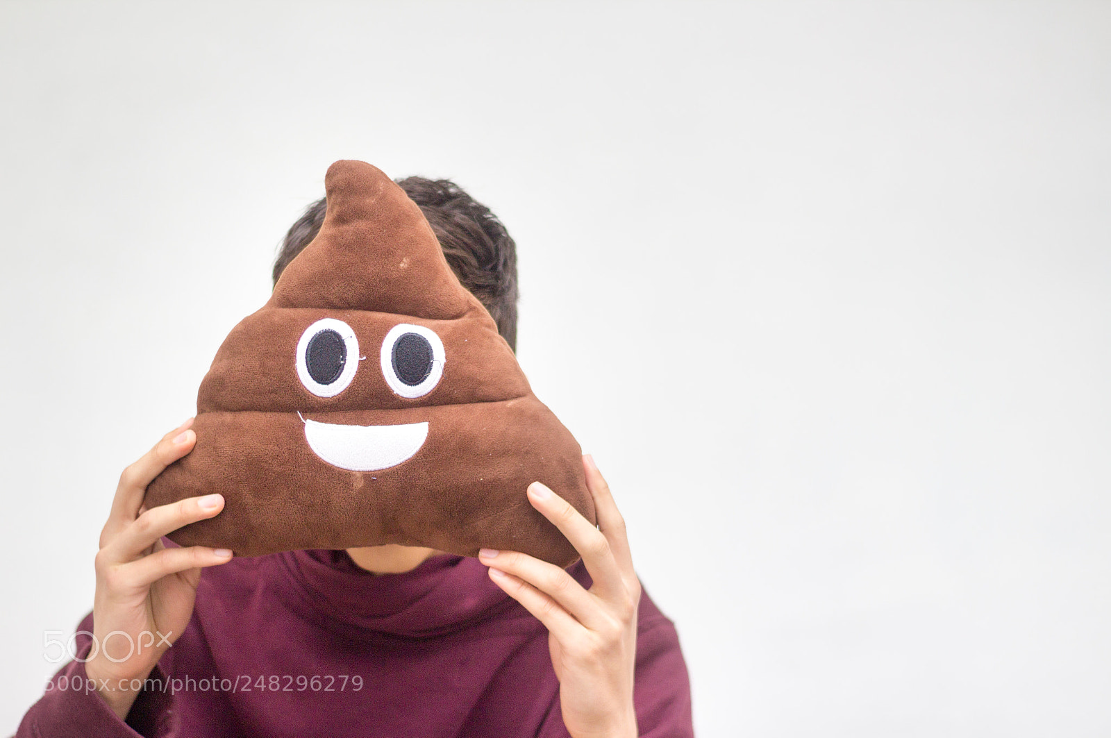 Canon EOS 1200D (EOS Rebel T5 / EOS Kiss X70 / EOS Hi) sample photo. Man with poop emoji photography