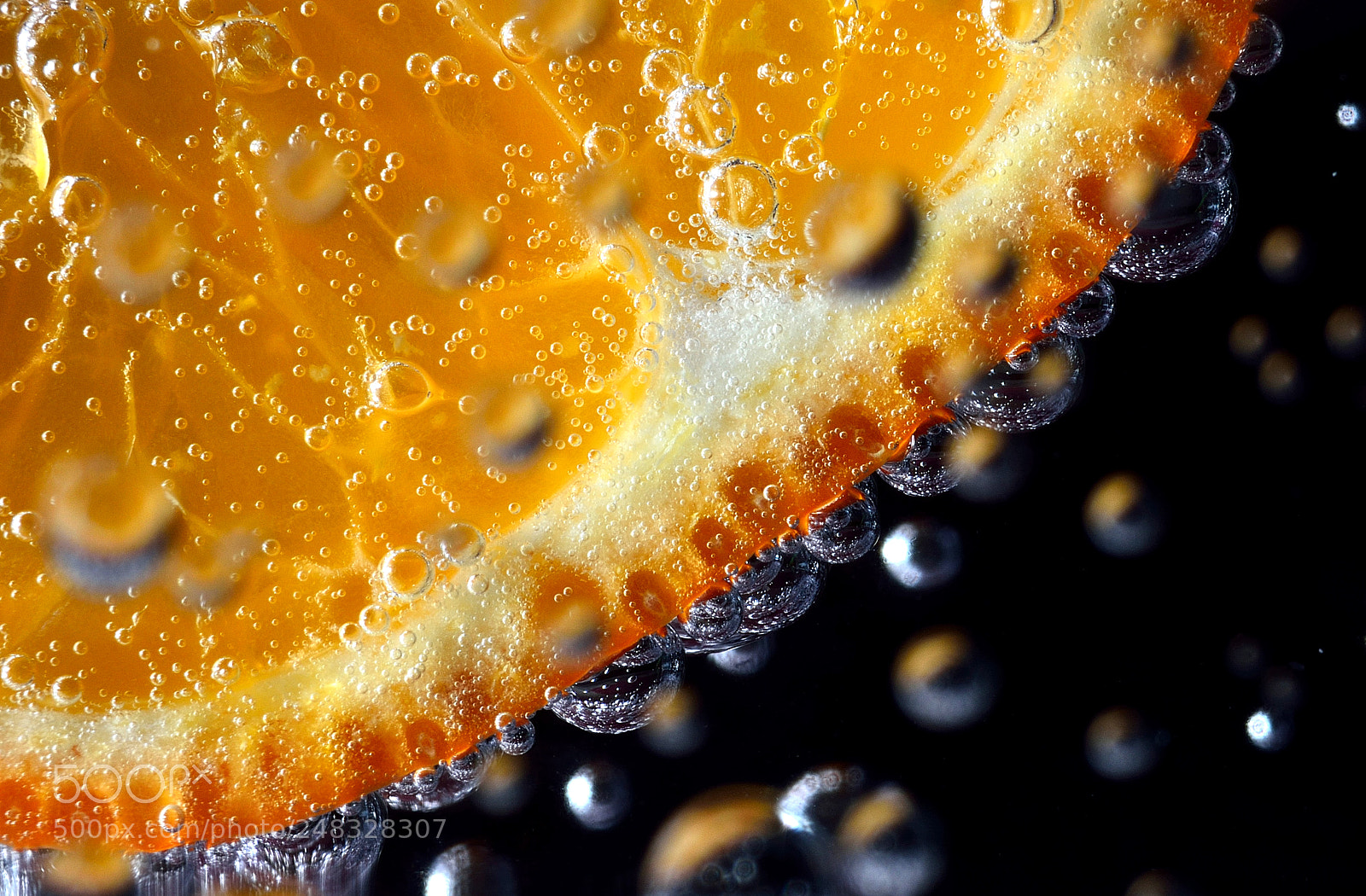 Nikon D5100 sample photo. Orange in mineral water photography