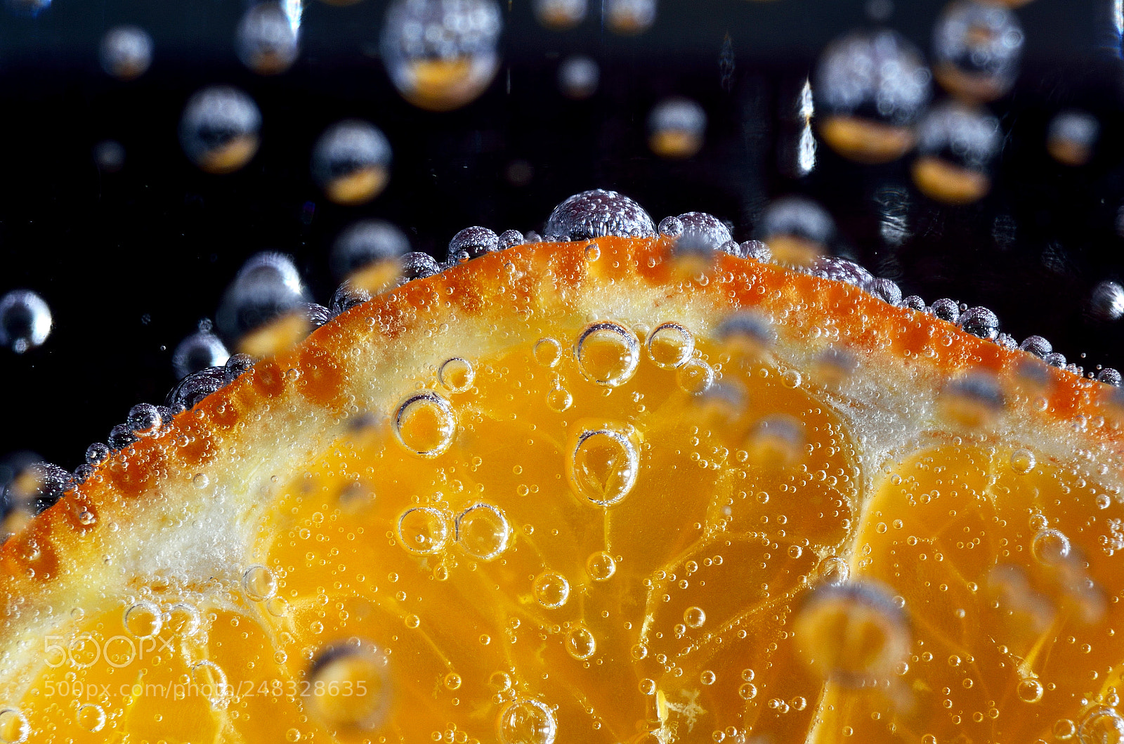 Nikon D5100 sample photo. Orange in mineral water photography
