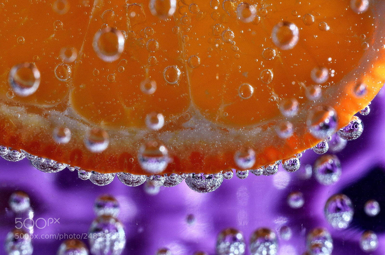 Nikon D5100 sample photo. Orange in mineral water photography