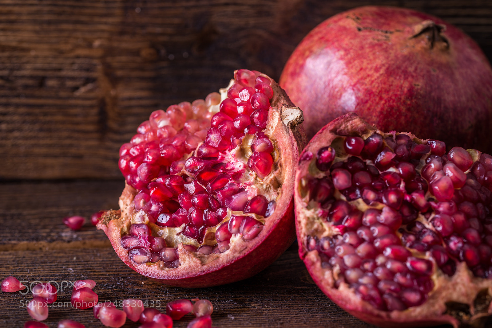 Nikon D610 sample photo. Pomegranate on wooden natural photography