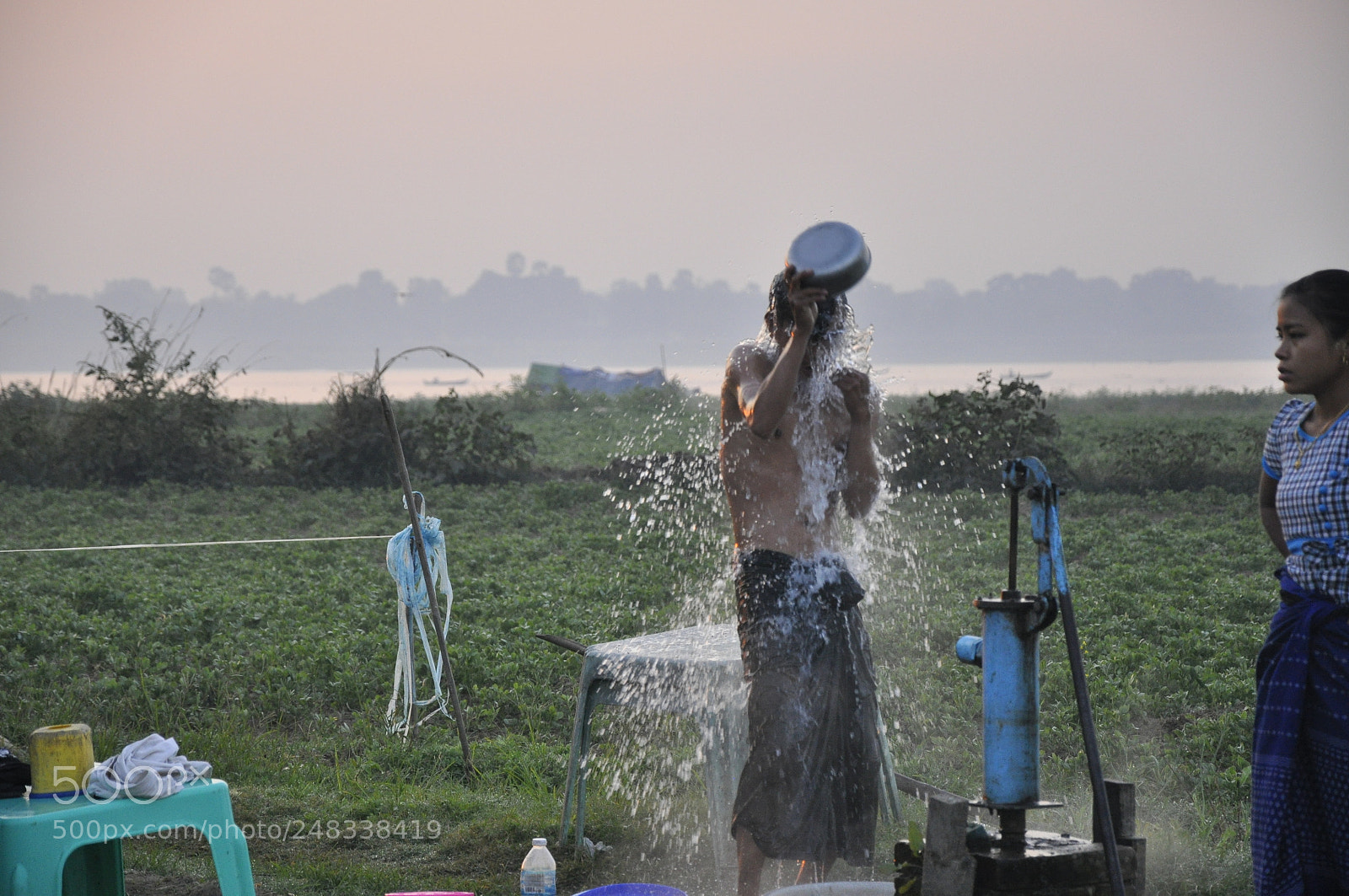 Nikon D90 sample photo. Man taking shower in photography
