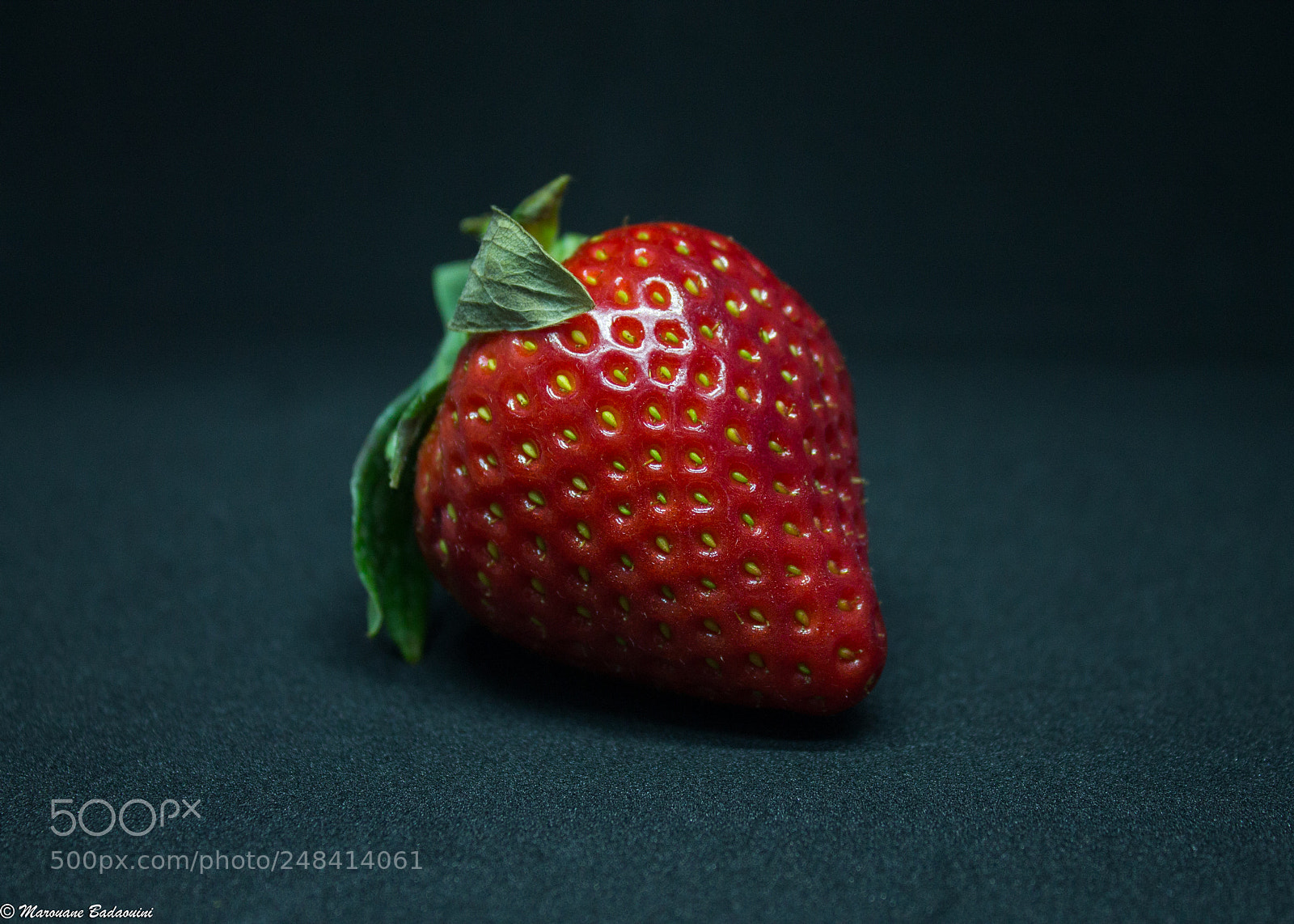 Canon EOS 1100D (EOS Rebel T3 / EOS Kiss X50) sample photo. An upset strawberry photography