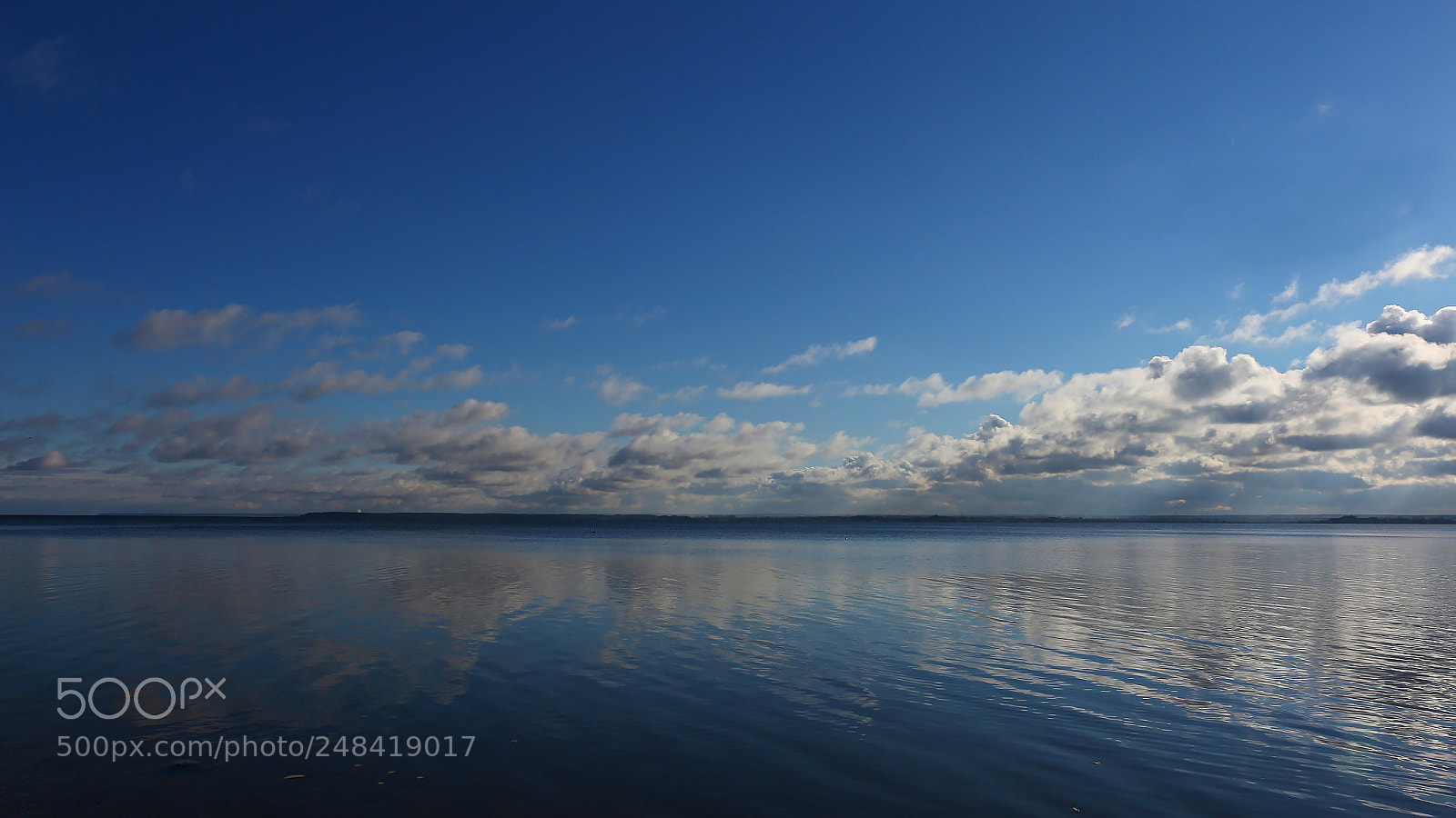 Canon EF-S 18-55mm F3.5-5.6 III sample photo. Clouds in the water photography