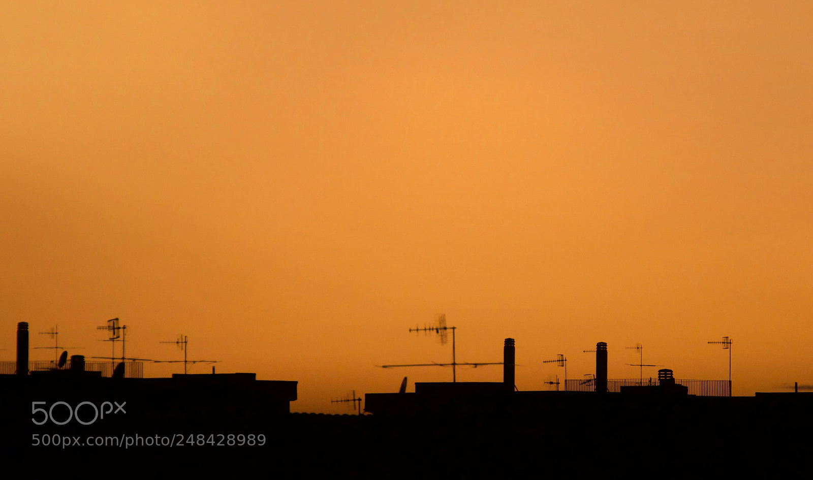 Canon EOS M3 sample photo. Roofs at sunset photography