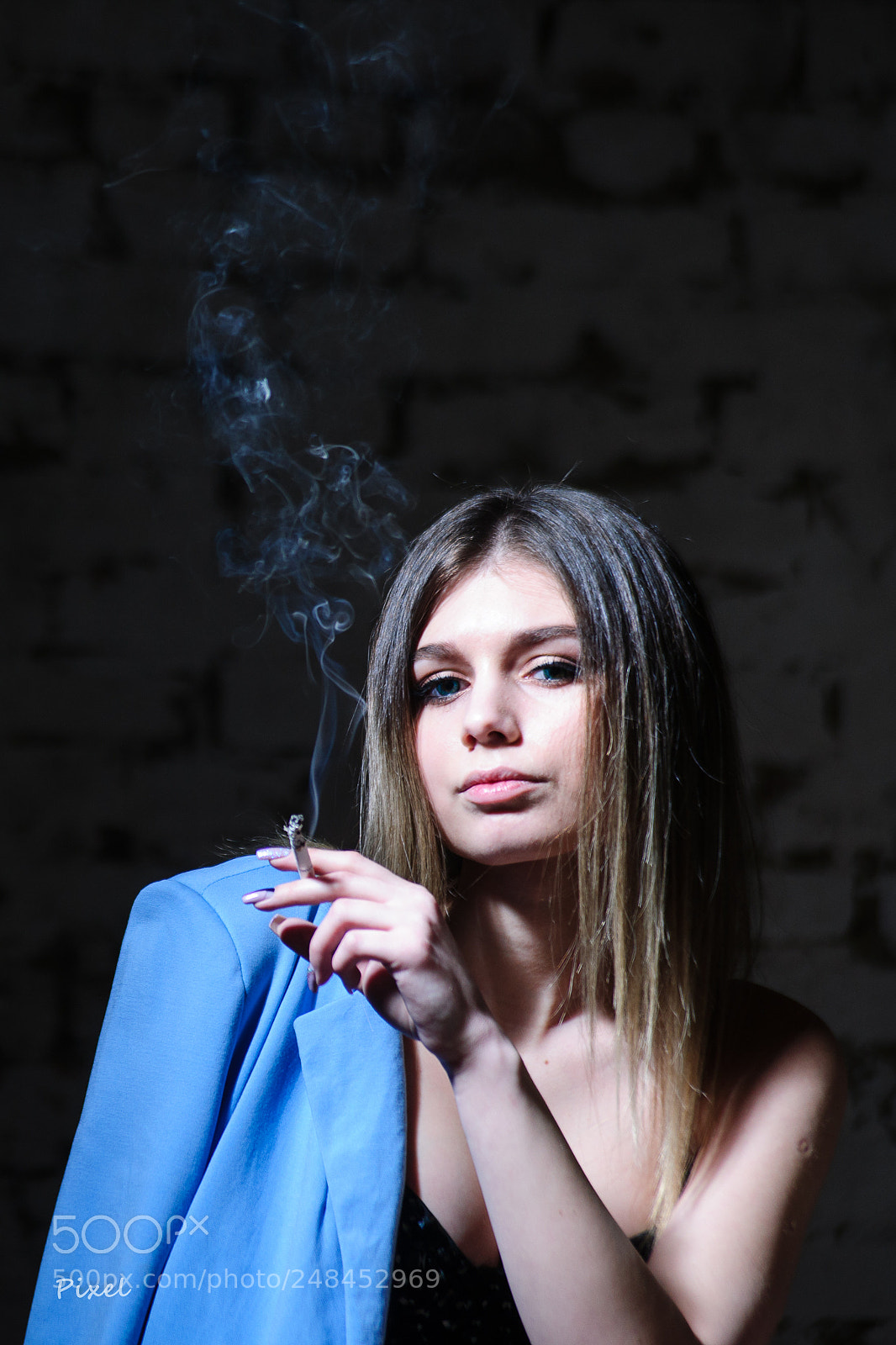 Sony Alpha DSLR-A850 sample photo. Smoking is harmful but photography