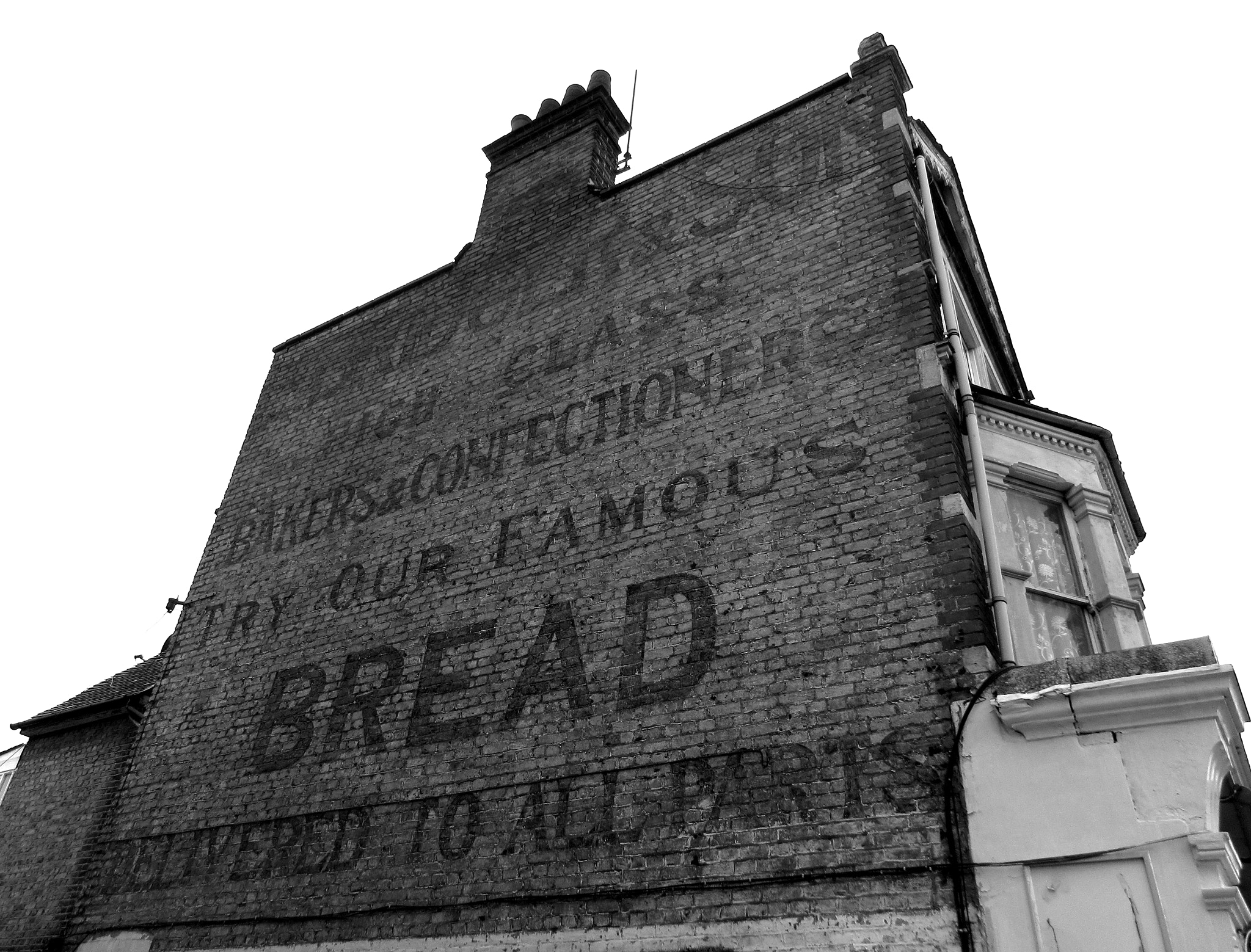 Canon PowerShot ELPH 350 HS (IXUS 275 HS / IXY 640) sample photo. Old shop wall sign in westcliff-on-sea, essex photography