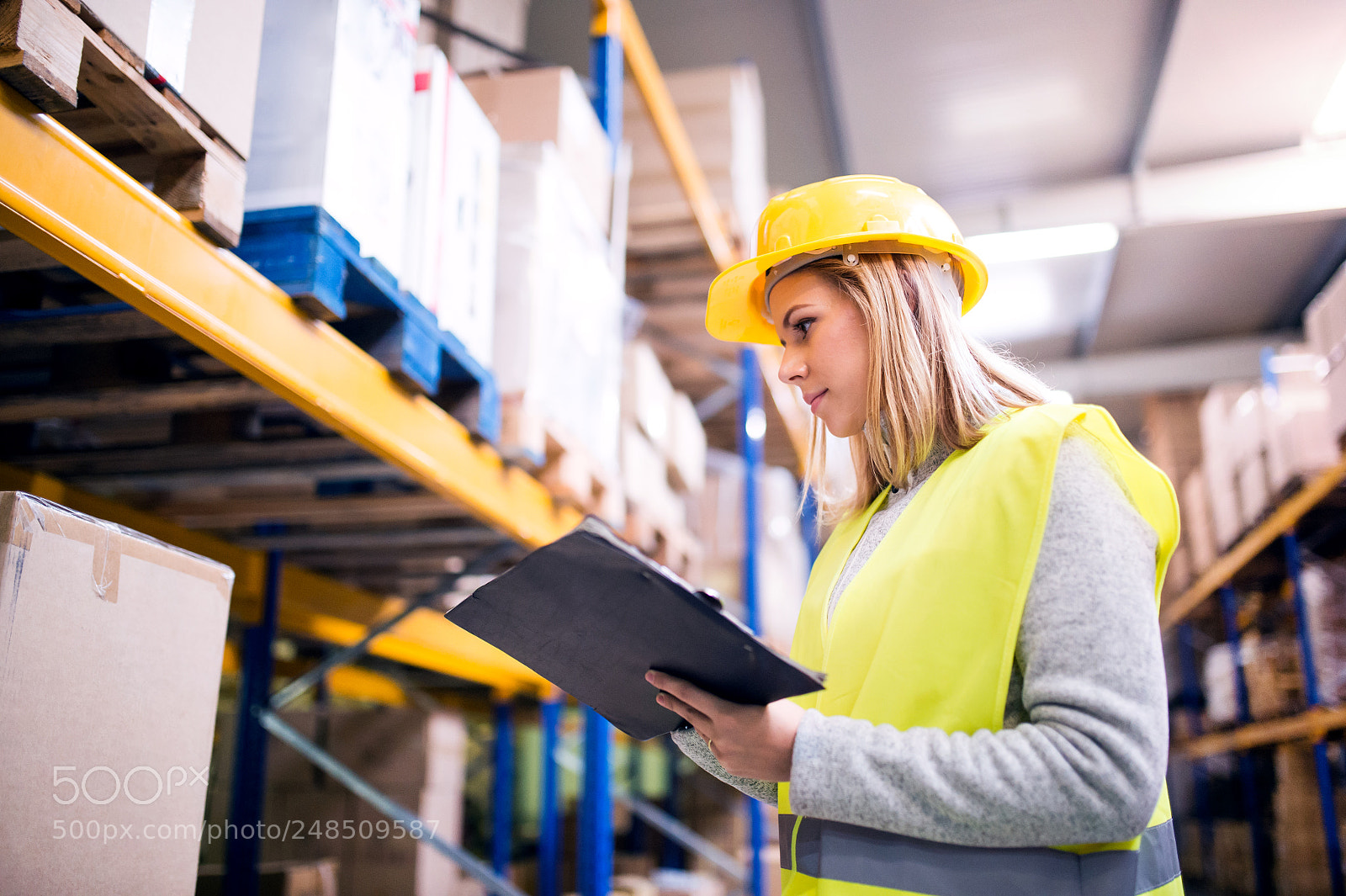 Nikon D4S sample photo. Woman warehouse worker with photography
