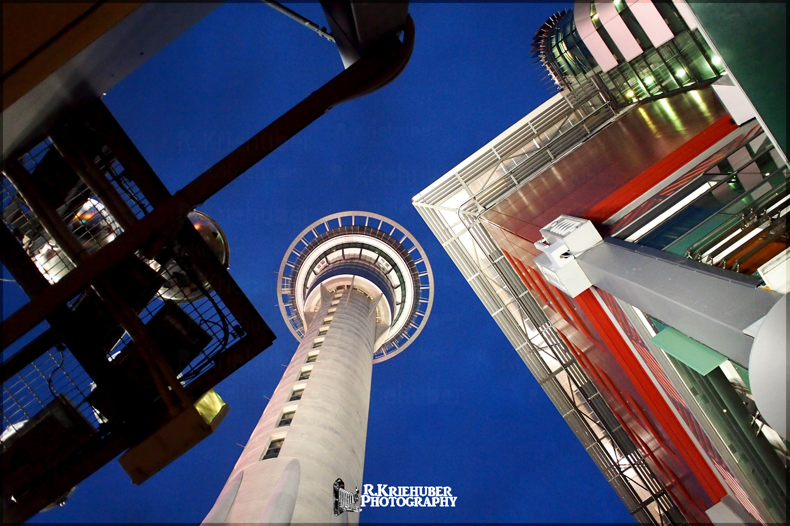 Olympus PEN E-P3 sample photo. Auckland in coral red & blue photography