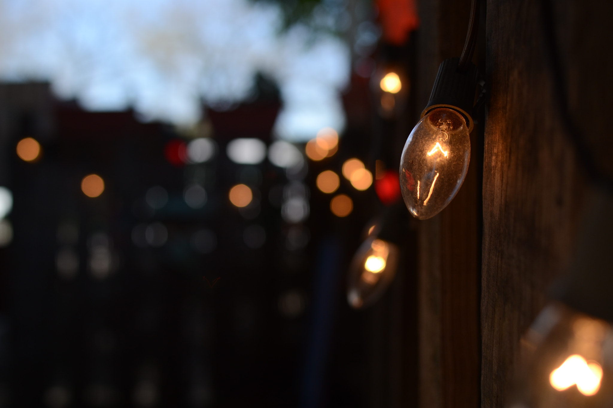 Nikon D3100 + Nikon AF-S DX Nikkor 35mm F1.8G sample photo. Bokeh lights photography
