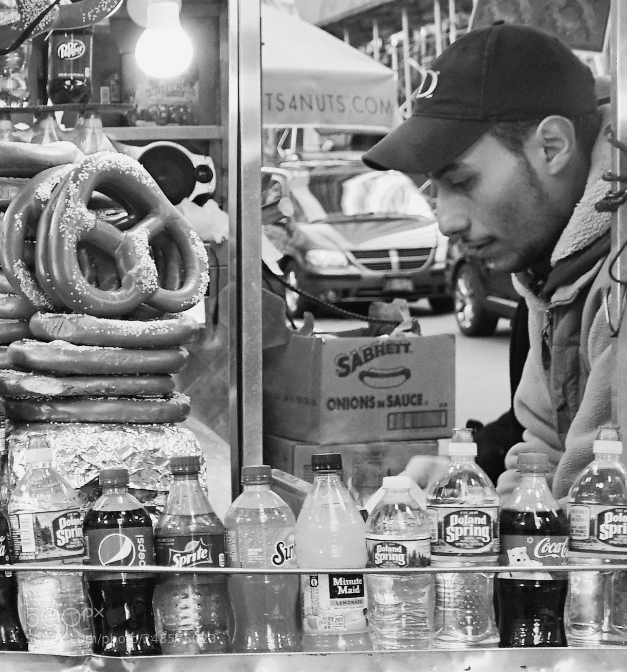 Sony a6000 sample photo. A sidewalk vendor in photography