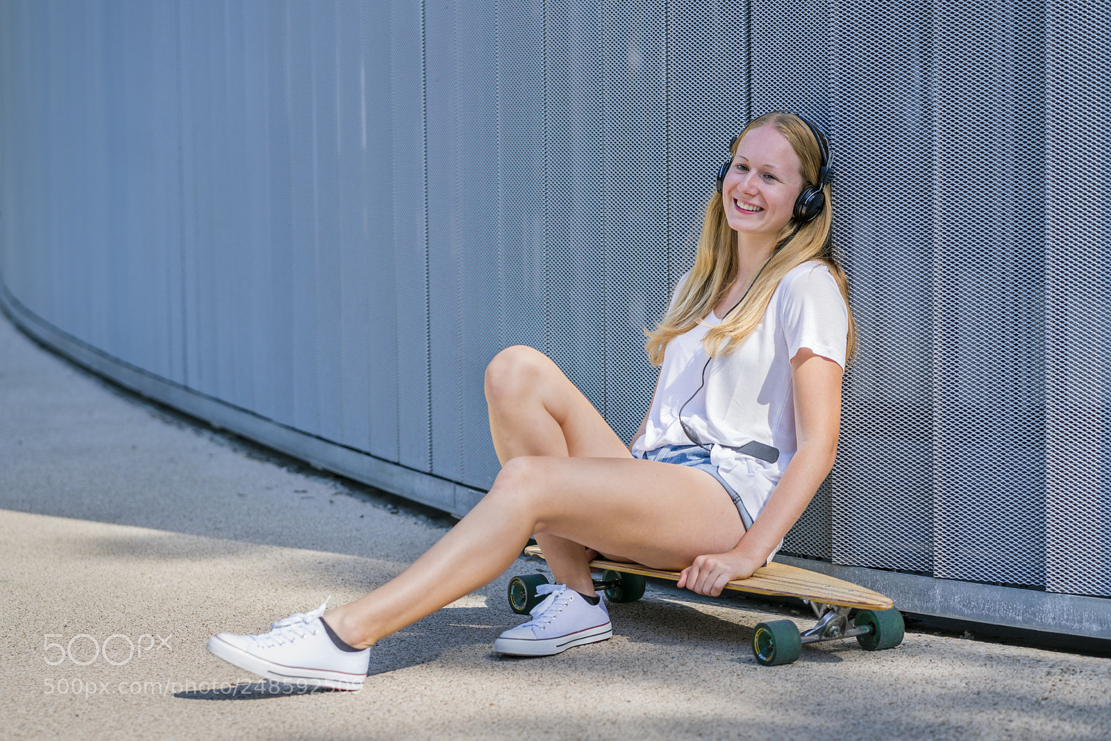 Sony a7R II sample photo. Young woman with longboard photography