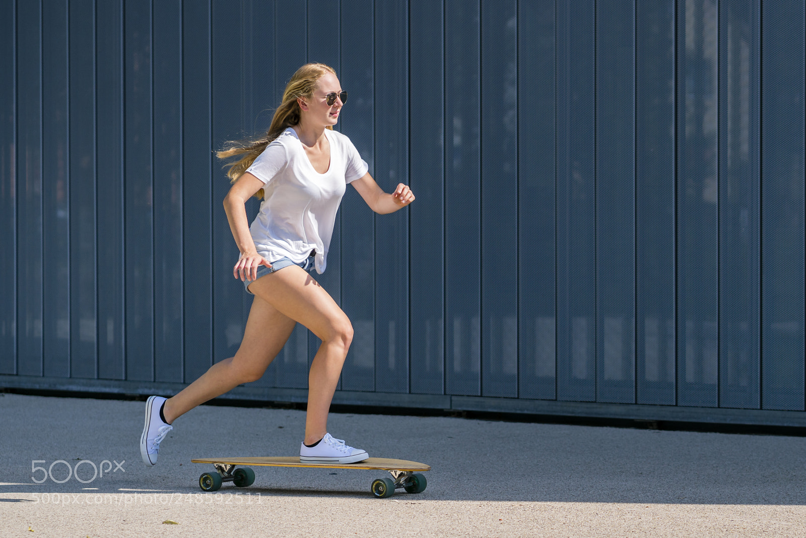 Sony a7R II sample photo. Young woman with longboard photography