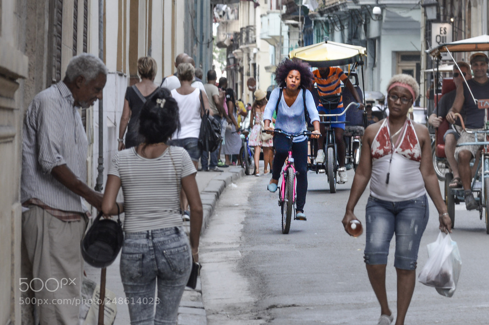 Nikon D3200 sample photo. Girl cycling, la habana photography