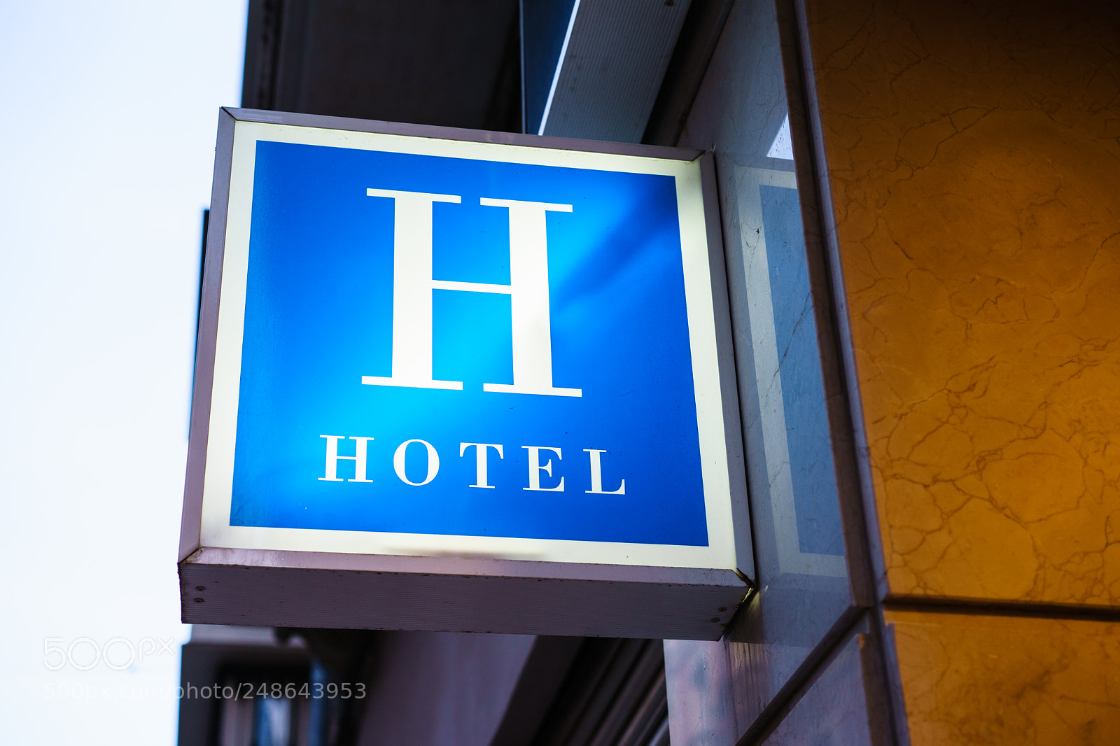 Sony a7 II sample photo. Hotel sign on wall photography