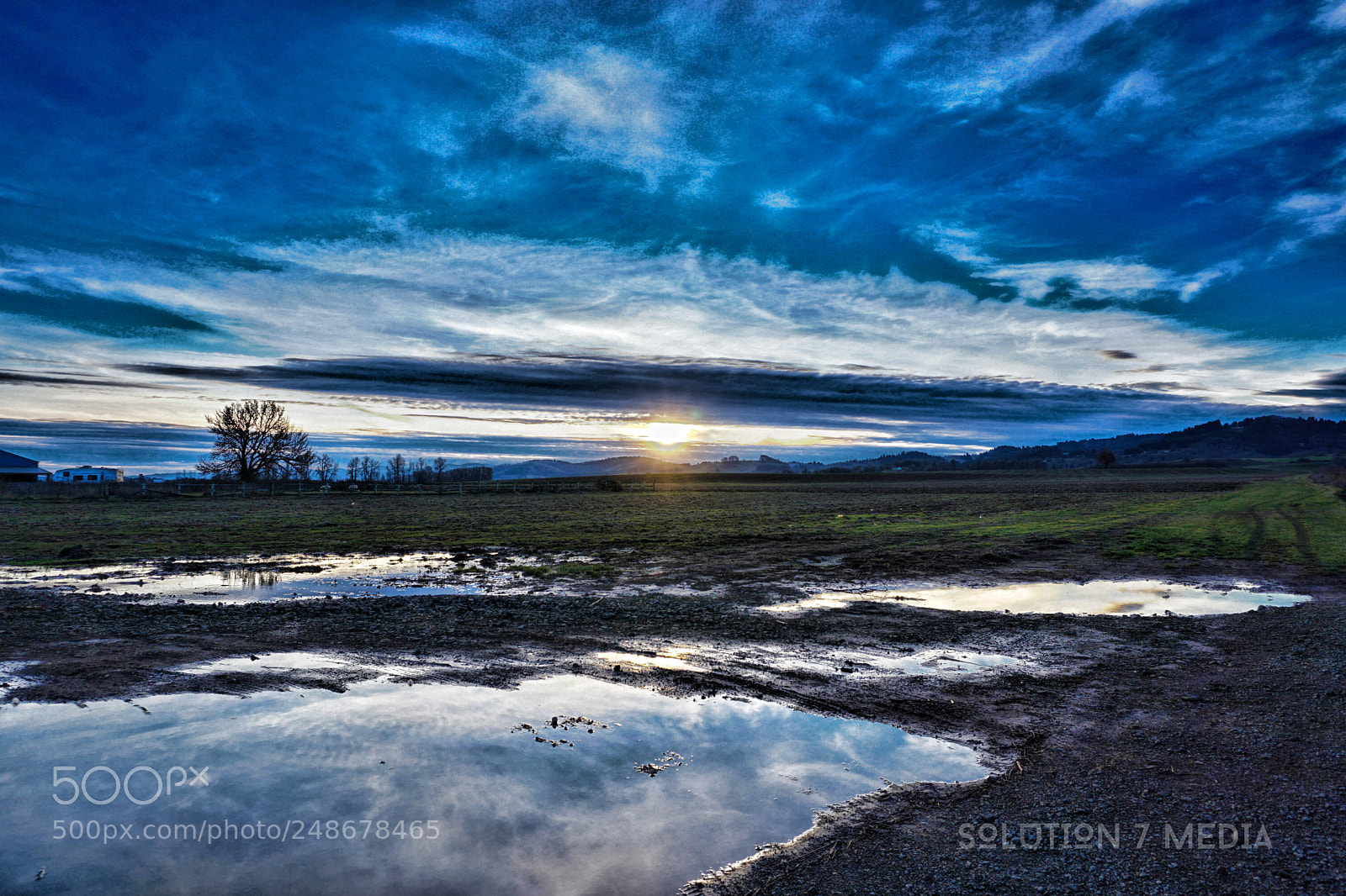 Sony a6000 sample photo. The painted blue cloudy photography