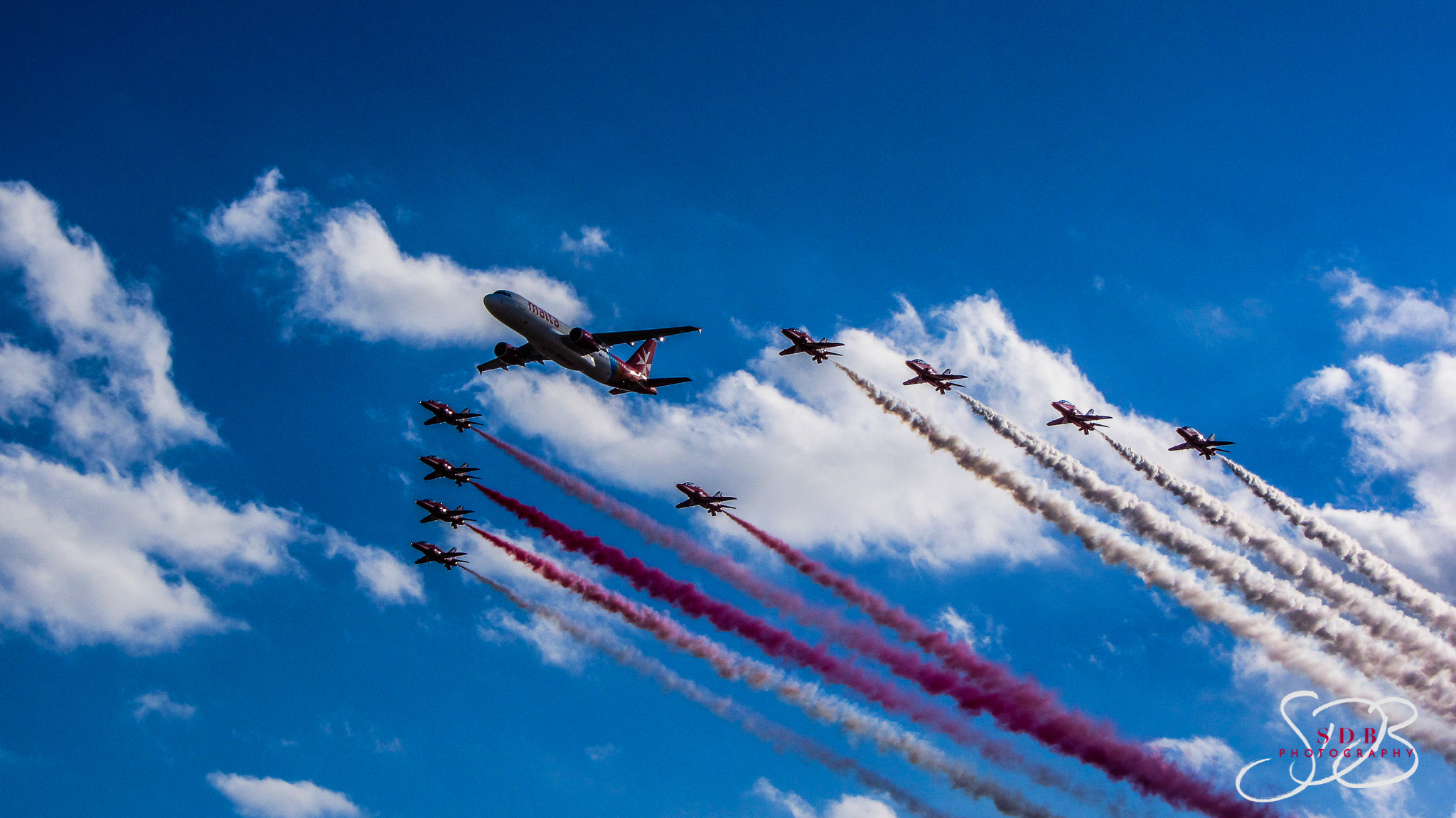 Canon PowerShot SX230 HS sample photo. Air malta and red arrow display photography