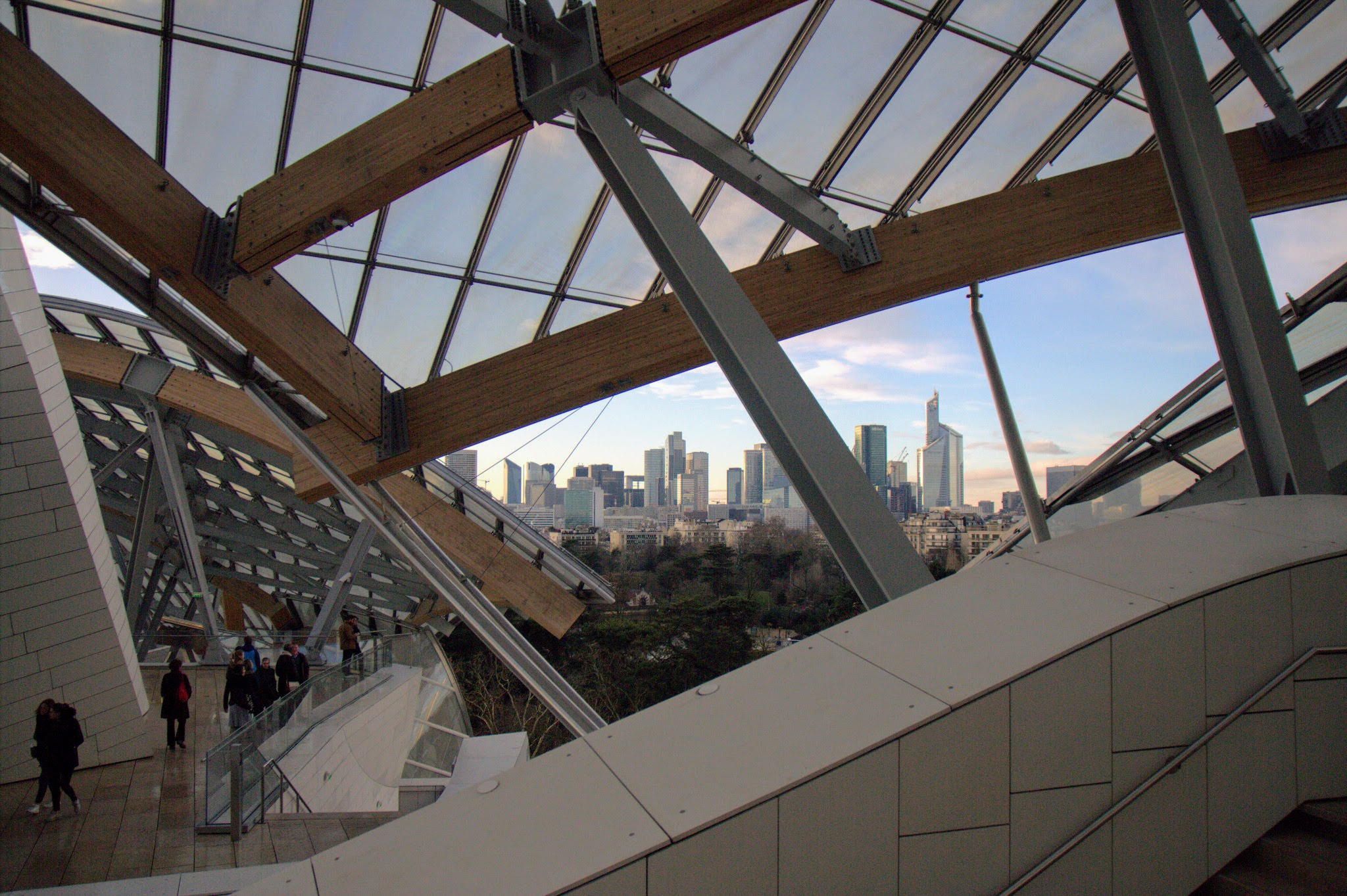 Canon EOS 600D (Rebel EOS T3i / EOS Kiss X5) + Sigma 17-70mm F2.8-4 DC Macro OS HSM sample photo. View of la défense(business quarter) from louis vuitton fondation paris photography