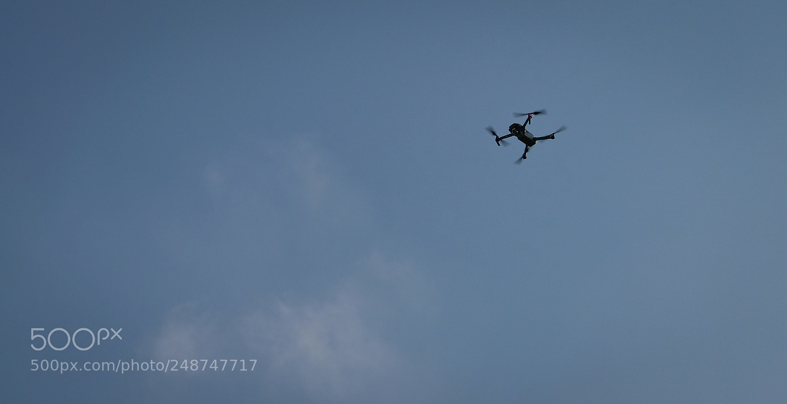 Fujifilm X-T20 sample photo. Camera drone against blue photography